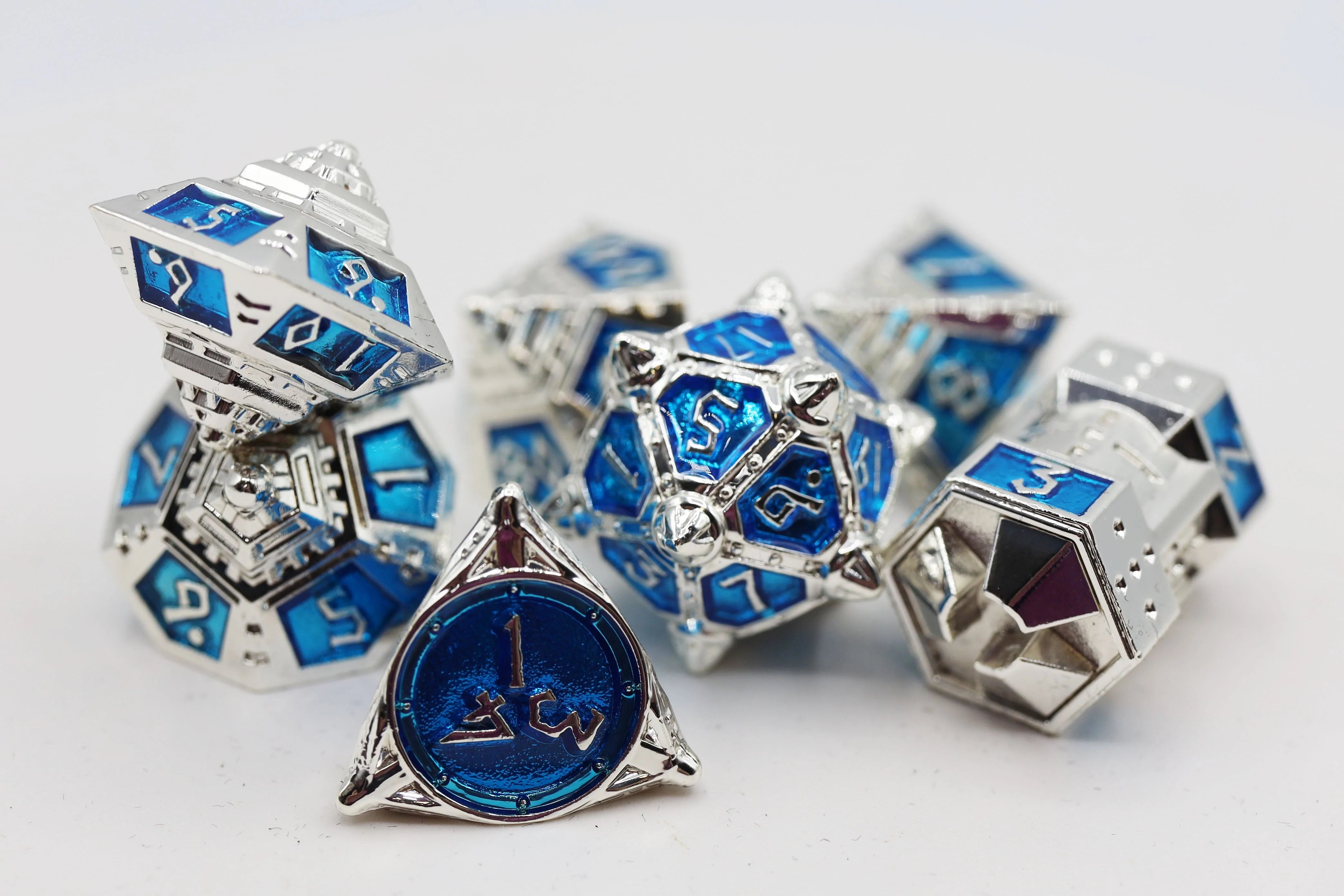 DICE 51: INTERSTELLAR INDIGO RPG METAL DICE SET Dice & Counters Foam Brain Games    | Red Claw Gaming